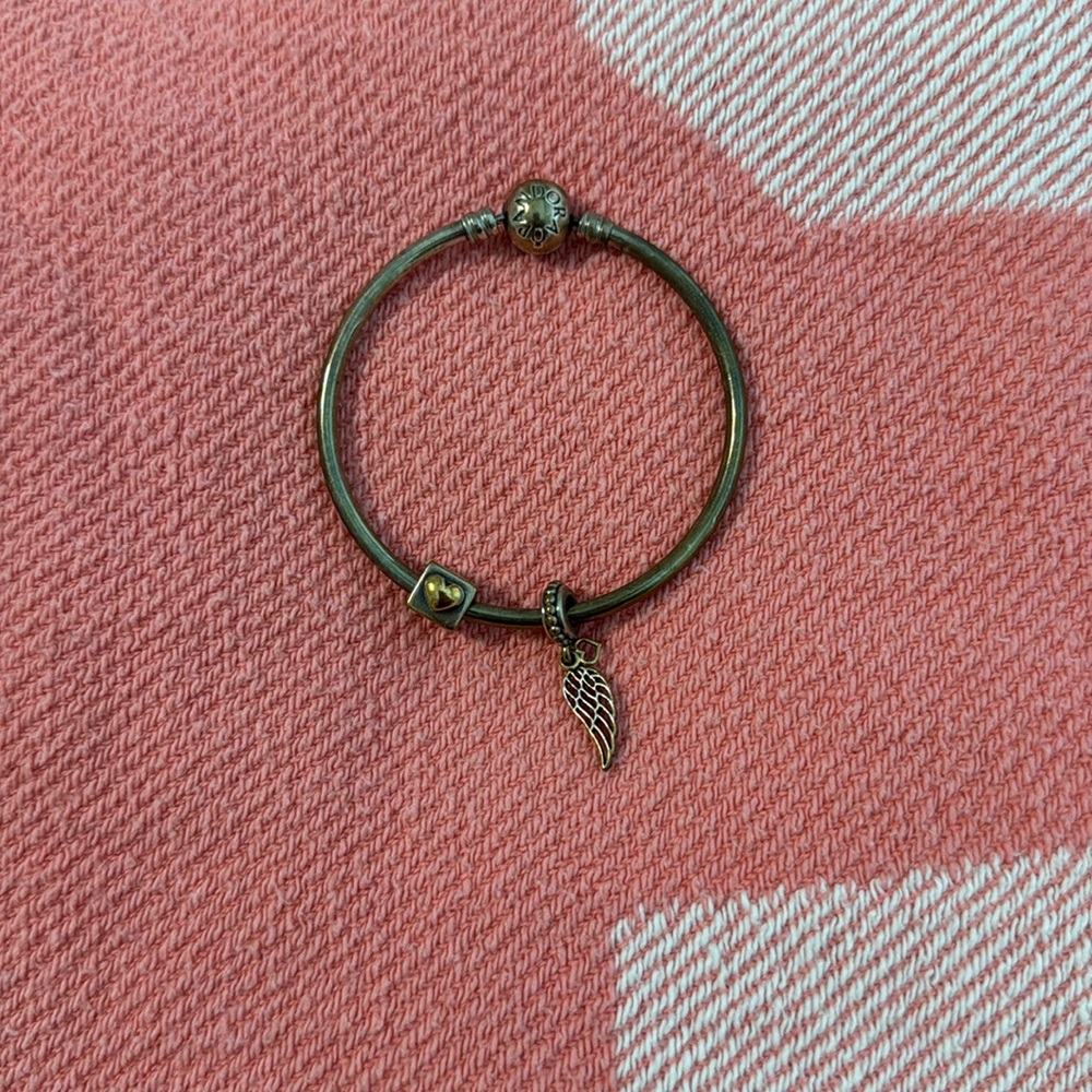 Pandora Bracelet & 2 charms selling as is - needs to be cleaned